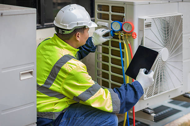 Professional Air Conditioning Repair technician working in Maple Lake, MN